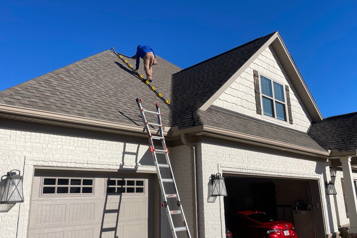 Roof inspection with ladder and Goat Roof Assist
